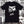 Load image into Gallery viewer, A collage background with the Hombre Lobo black shirt depicting an abstract werewolf.