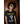 Load image into Gallery viewer, A cool young man wearing a black Cobra Boss shirt that depicts a colorful 8 bit cobra and the words Game Over.