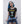 Load image into Gallery viewer, A cool young woman wearing the retro ringer Cobra Boss tee that depicts a colorful 8 bit cobra and the words Game Over.
