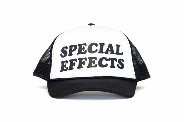 The front of a black and white trucker hat with the text Special Effects printed in black. 